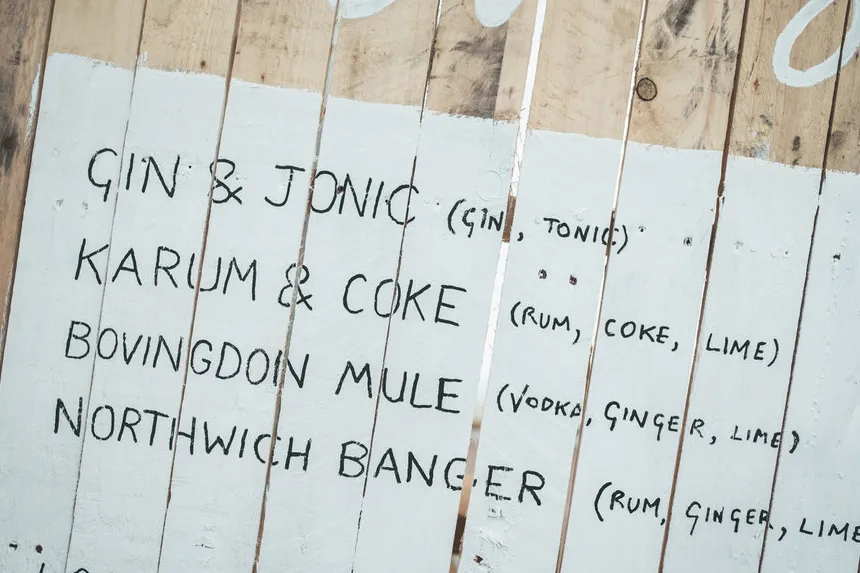 rustic wooden bar sign